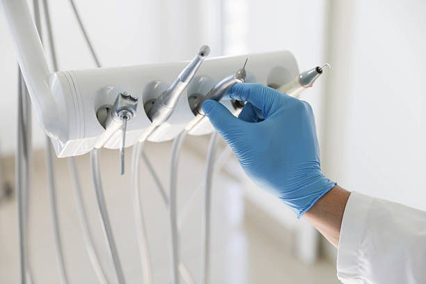 Professional Tooth Extraction technician working in Dresser, WI